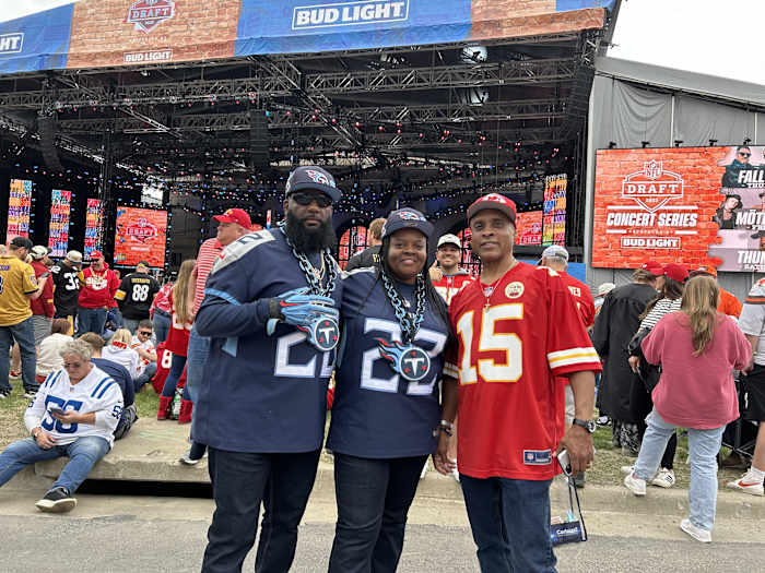 The Dunbars with their uncle, Johnny McClendon, who's a Chiefs fan living in Kansas City. (AllTitans.com photo by Tom Brew)