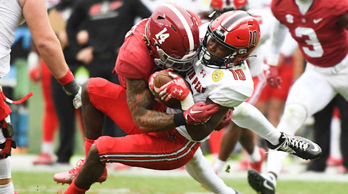 Alabama DB Brian Branch makes a hard tackle