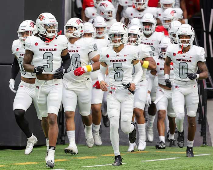 LAS VEGAS, NEVADA - APRIL 08 UNLV Rebels runs onto the field  before the team's spring showcase scrimmage at Allegiant Stadium on April 08, 2023 in Las Vegas, Nevada. (Photo by Ethan Miller/Getty Images)
