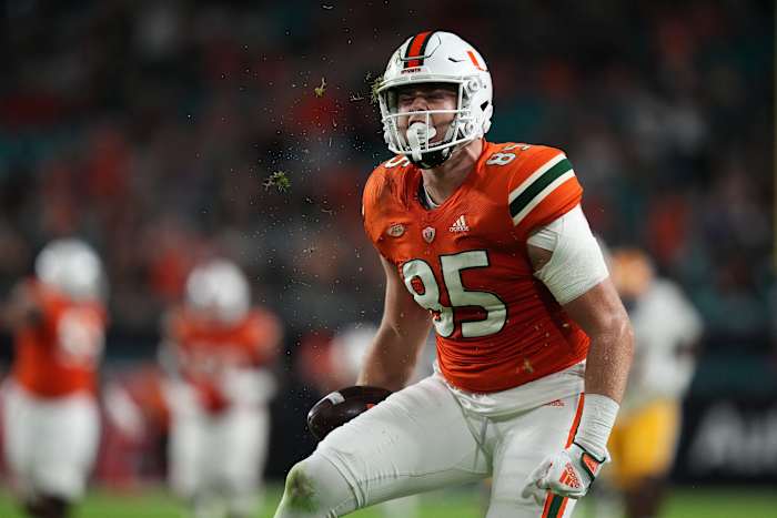 Nov 26, 2022; Miami Gardens, Florida, USA; Miami Hurricanes tight end Will Mallory (85) reacts after making a catch against the Pittsburgh Panthers during the first half at Hard Rock Stadium.