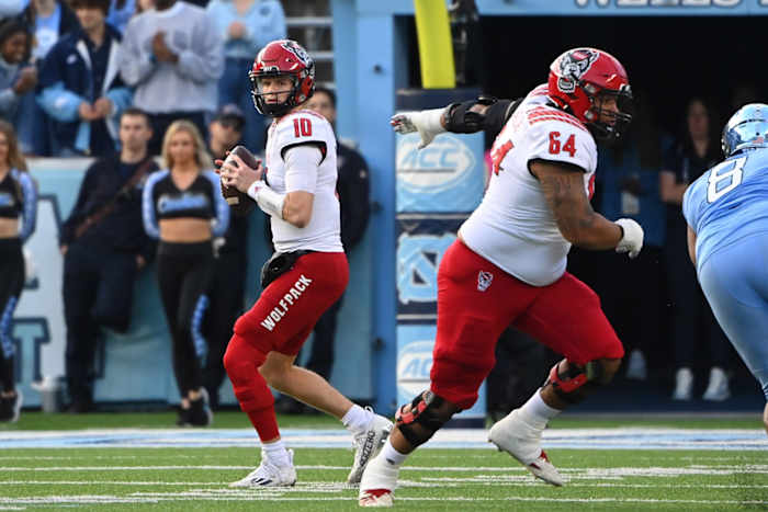 North Carolina State Wolfpack quarterback Ben Finley (10) looks to pass as guard Chandler Zavala (64) blocks. Mandatory Credit: Bob Donnan-USA TODAY