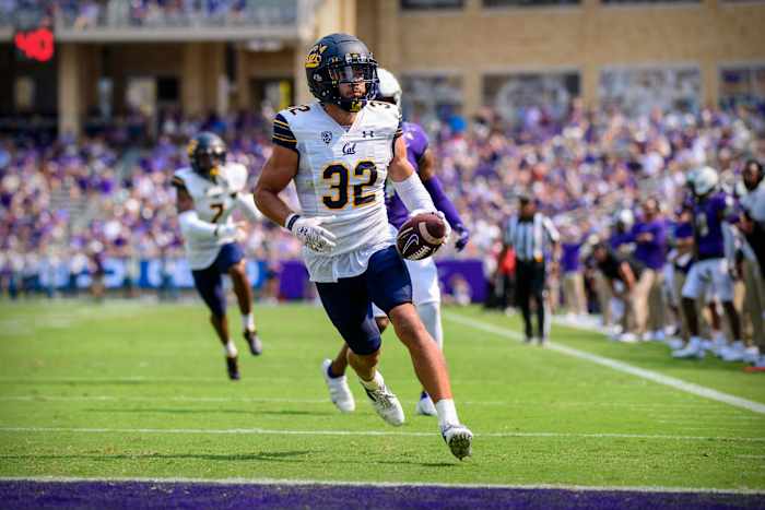 Sep 11, 2021; Fort Worth, Texas, USA; California Golden Bears safety Daniel Scott (32) intercepts a pass by TCU Horned Frogs quarterback Max Duggan (not pictured) and returns it for a touchdown during the first half of the game at Amon G. Carter Stadium. Mandatory Credit: Jerome Miron-USA TODAY Sports