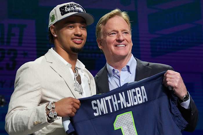 Seattle Seahawks first-round draft pick Jaxon Smith-Njigba with NFL commissioner Roger Goodell