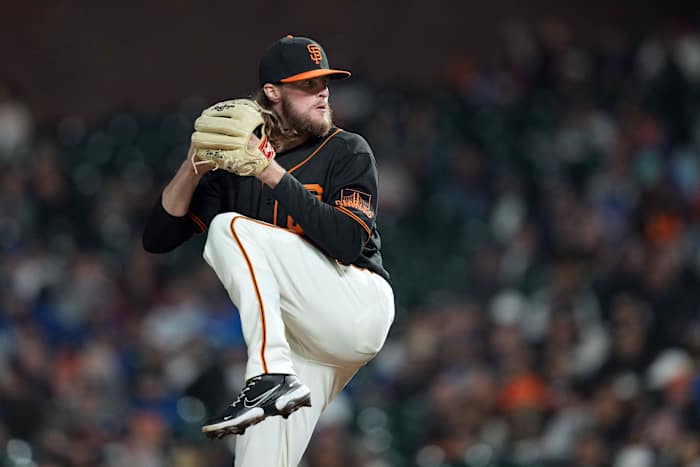 SF Giants relief pitcher Cole Waites throws a pitch against the Los Angeles Dodgers. (2022)
