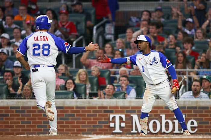 May 6, 2023; Atlanta, Georgia, USA; Atlanta Braves first baseman Matt Olson (28) celebrates after scoring with second baseman Ozzie Albies (1) against the Baltimore Orioles in the fourth inning at Truist Park.