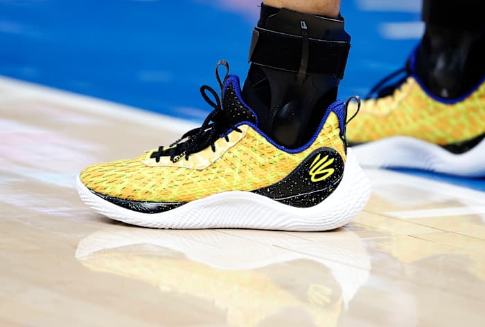View of Stephen Curry's yellow and black shoes.