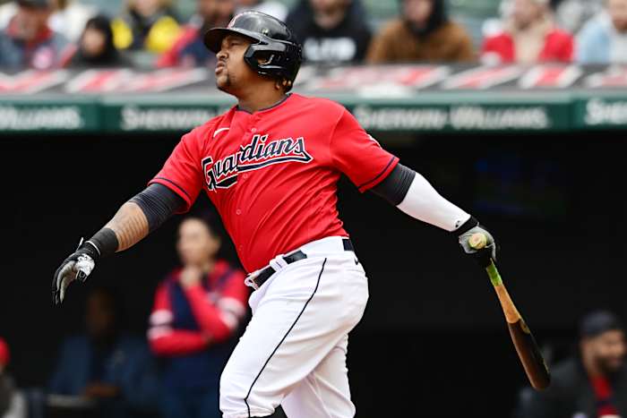 Apr 23, 2023; Cleveland, Ohio, USA; Cleveland Guardians third baseman Jose Ramirez (11) hits a home run during the third inning against the Miami Marlins at Progressive Field. Mandatory Credit: Ken Blaze-USA TODAY Sports
