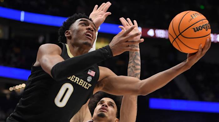 Vanderbilt guard Tyrin Lawrence goes for a lay-up