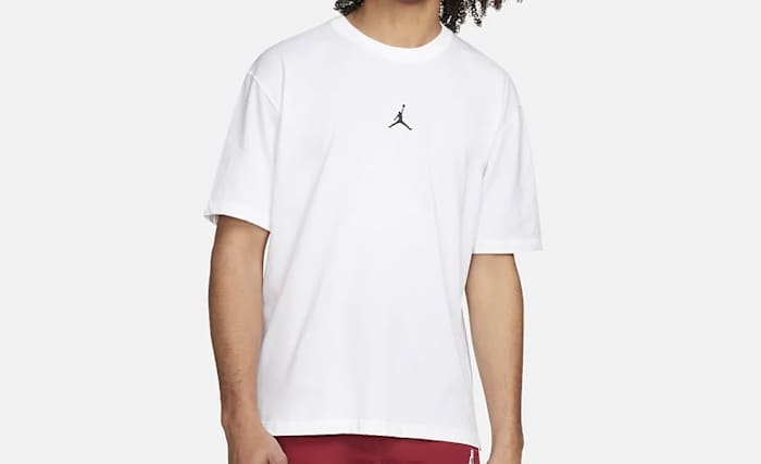View of white and black Jordan t-shirt.