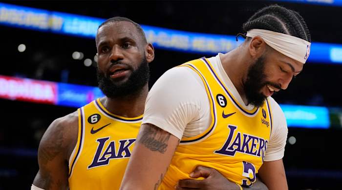 LeBron James grabs Anthony Davis after a Lakers basket.