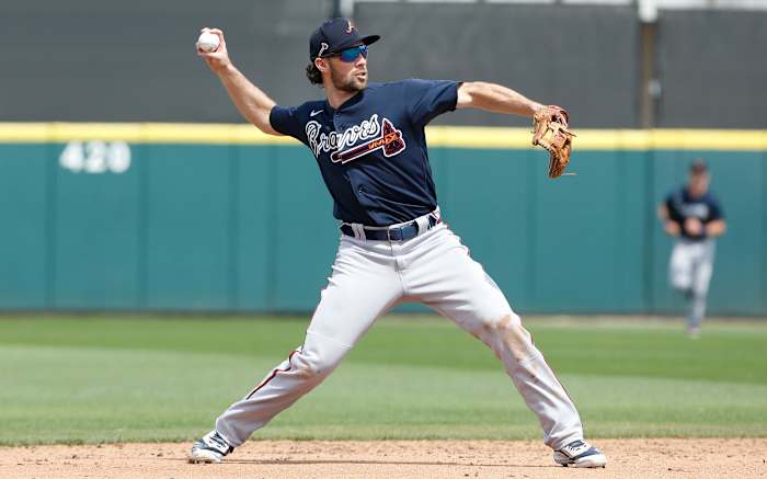 Mar 12, 2020; Lakeland, Florida, USA; Atlanta Braves infielder Charlie Culberson (8) thyrows to firsat for the inning ending out during the fourth inning against the Detroit Tigers at Publix Field at Joker Marchant Stadium.