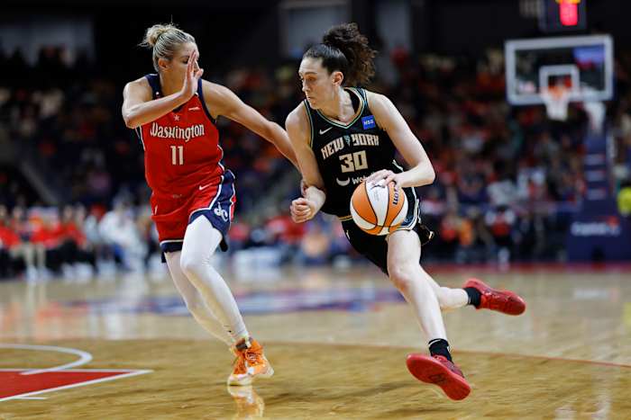 New York Liberty forward Breanna Stewart dribbles past Washington Mystics forward Elena Delle Donne.