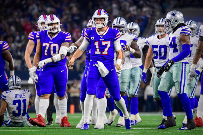 Bills quarterback Josh Allen celebrates after a big play against the Cowboys.