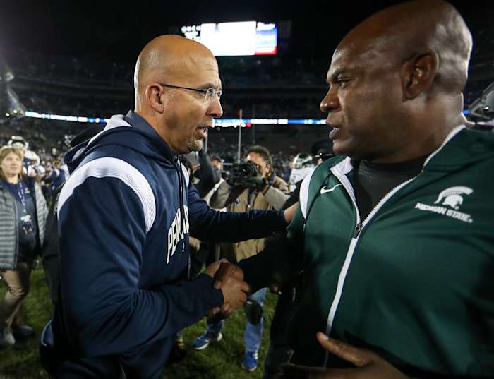 Penn State coach James Franklin shakes hands with Michigan State coach Mel Tucker after their 2022 game at Beaver Stadium.