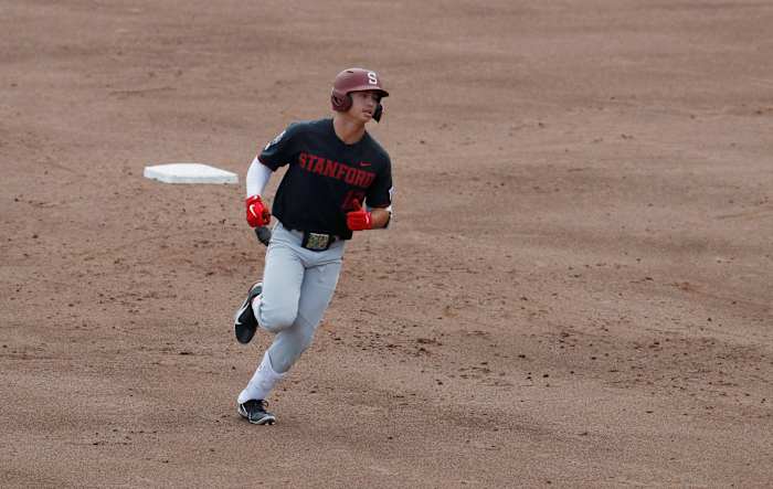 Jun 21, 2021; Omaha, Nebraska, USA; Stanford Cardinal designated hitter Tommy Troy (12) rounds the bases after hitting a home run against the Arizona Wildcats at TD Ameritrade Park. Mandatory Credit: Bruce Thorson-USA TODAY Sports