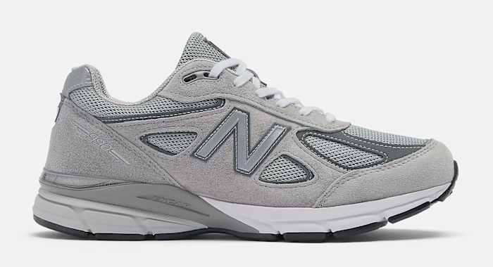 Side view of a grey New Balance shoe.