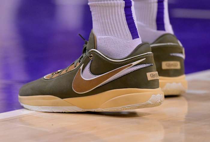 Anthony Davis' green and tan Nike LeBron shoes.