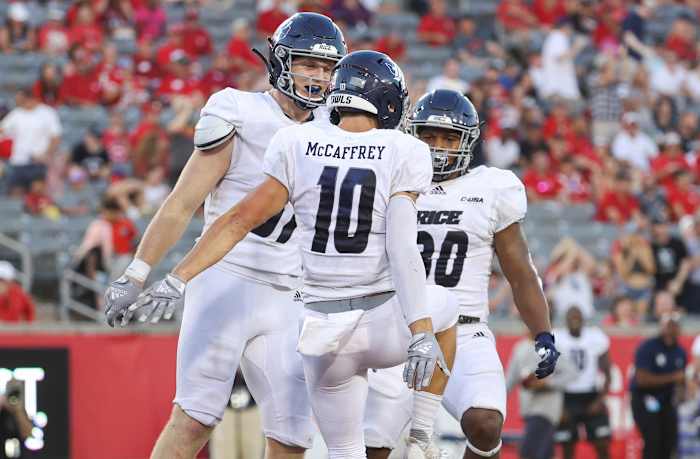 Sep 24, 2022; Houston, Texas, USA; Rice Owls wide receiver Luke McCaffrey (10) celebrates with tight end Jack Bradley (87) after scoring a touchdown during the third quarter against the Houston Cougars at TDECU Stadium. Mandatory Credit: Troy Taormina-USA TODAY Sports