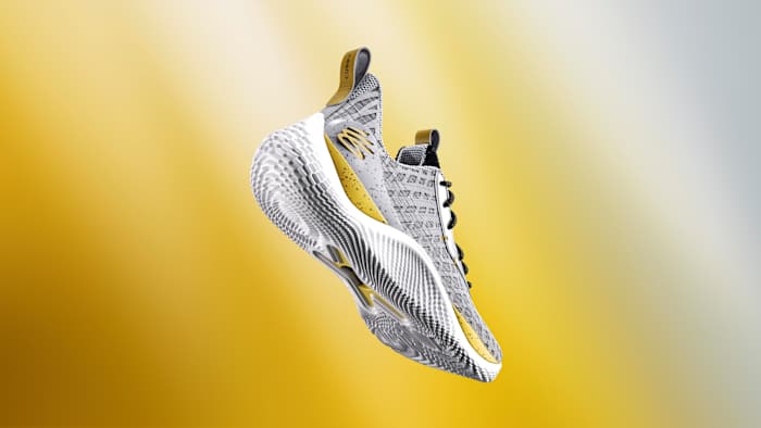 Rear view of Stephen Curry's grey and gold shoes.