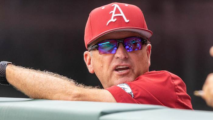 Razorbacks coach Dave Van Horn in the dugout Sunday against TCU