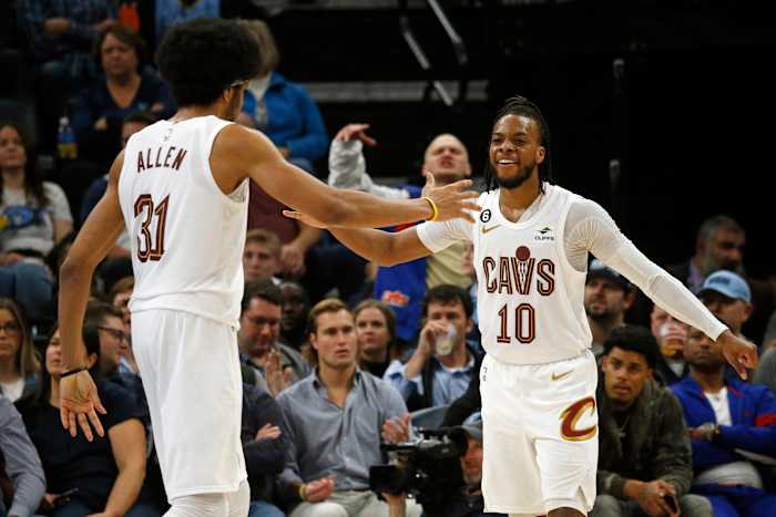 Jan 18, 2023; Memphis, Tennessee, USA; Cleveland Cavaliers guard Darius Garland (10) reacts with Cleveland Cavaliers center Jarrett Allen (31) during the second half against the Memphis Grizzlies at FedExForum. Mandatory Credit: Petre Thomas-USA TODAY Sports