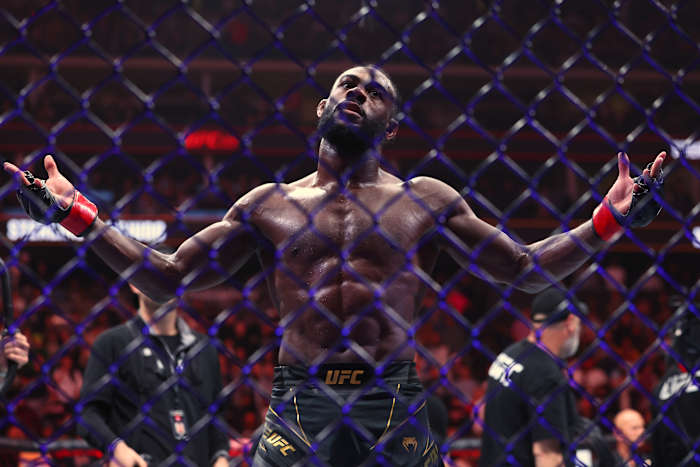 UFC Bantamweight Champion Aljamain Sterling poses following a title fight.