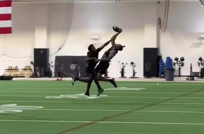 Buffs receiver Javon Antonio makes a one-handed grab over defensive back in practice on June 13, 2023