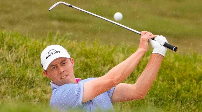Matt Fitzpatrick hits a bunker shot in the first round of the 2023 U.S. Open.