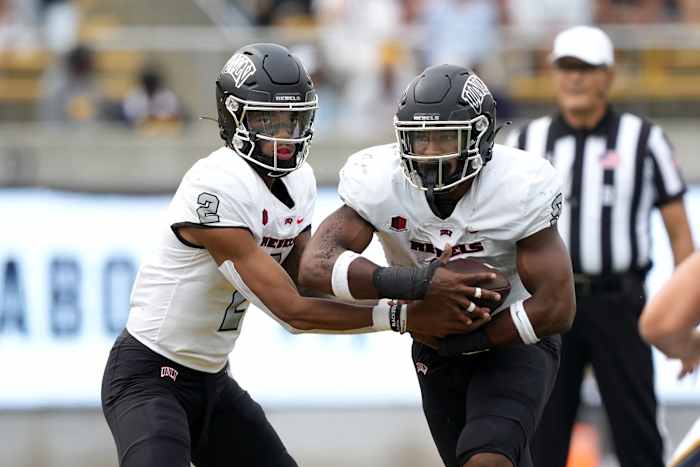Sep 10, 2022; Berkeley, California, USA; UNLV Rebels quarterback Doug Brumfield (2) hands off to running back Aidan Robbins (9) during the third quarter against the California Golden Bears at FTX Field at California Memorial Stadium. Mandatory Credit: Darren Yamashita-USA TODAY Sports