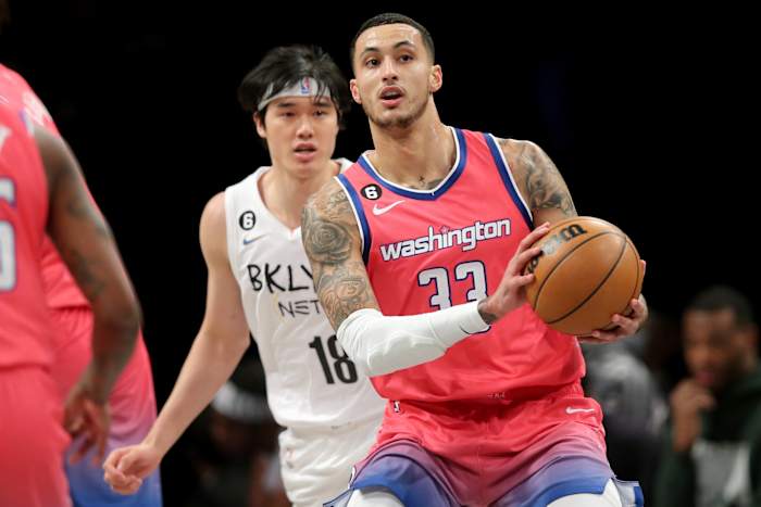 Washington Wizards forward Kyle Kuzma (33) controls the ball against Brooklyn Nets forward Yuta Watanabe (18) during the first quarter at Barclays Center.