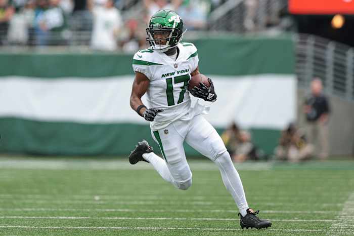 Jets' WR Garrett Wilson runs after making a catch in 2022