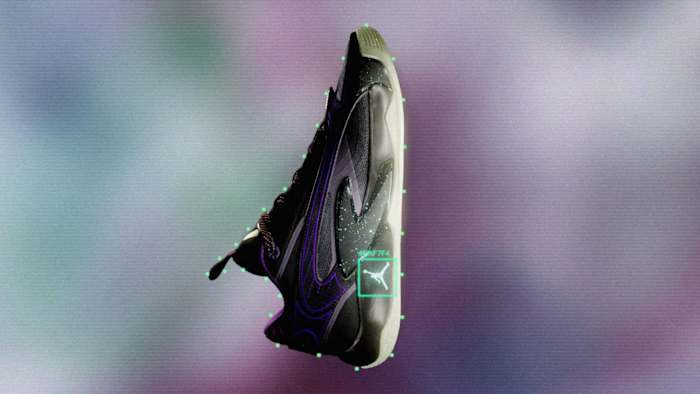 Side view of Luka Doncic's purple and black Jordan Brand shoes.