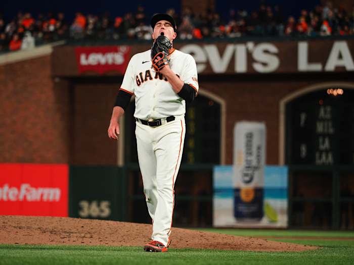 SF Giants relief pitcher Luke Jackson walks off the mound against the San Diego Padres. (2023)