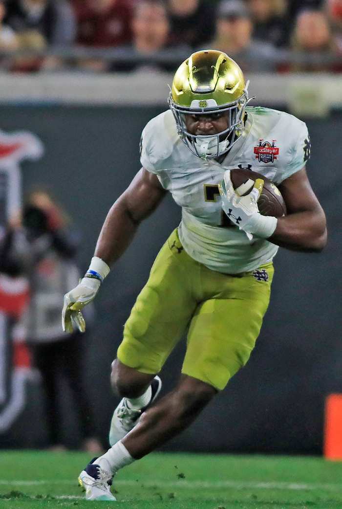 Notre Dame Fighting Irish running back Audric Estime (7) pulls in a pass during Friday night's victory over the South Carolina Gamecocks. The University of Notre Dame Fighting Irish took on the University of South Carolina Gamecocks in the TaxSlayer Gator Bowl game in Jacksonville, Florida's TIAA Bank Field Friday, December 30, 2022. The first half ended with South Carolina holding a 24 to 17 lead but Notre Dame came back and with a late fourth-quarter touchdown, won the game 45 to 38. ND GAME 12