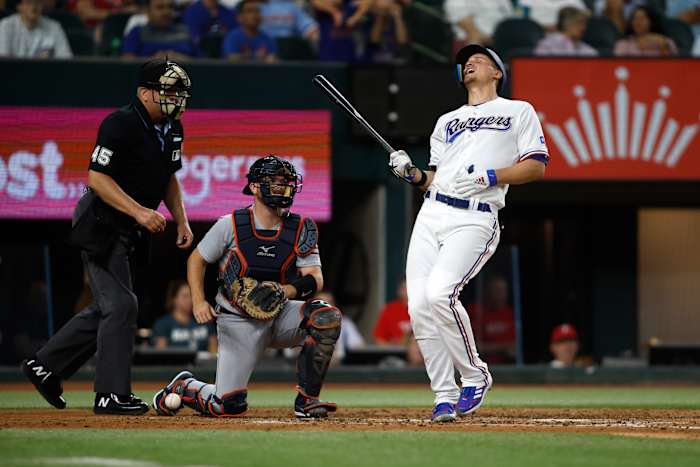 Jun 26, 2023; Arlington, Texas, USA; Texas Rangers shortstop Corey Seager (5) reacts after being hit by a pitch in the fifth inning against the Detroit Tigers at Globe Life Field. Mandatory Credit: Tim Heitman-USA TODAY Sports