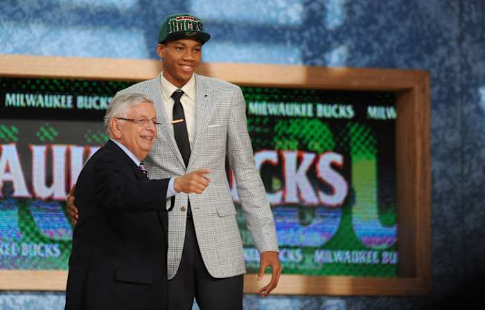Giannis Antetokounmpo poses for a photo with NBA commissioner David Stern after being selected as the number fifteen overall pick to the Milwaukee Bucks during the 2013 NBA Draft