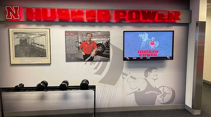 A display of the original weights from the Nebraska football team.
