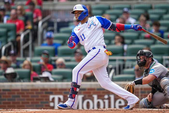 Jul 1, 2023; Cumberland, Georgia, USA; Atlanta Braves shortstop Orlando Arcia (11) doubles to drive in a run against the Miami Marlins during the first inning at Truist Park.