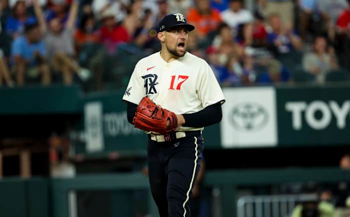 JTexas Rangers starting pitcher Nathan Eovaldi reacts after the seventh inning against the Houston Astros at Globe Life Field.