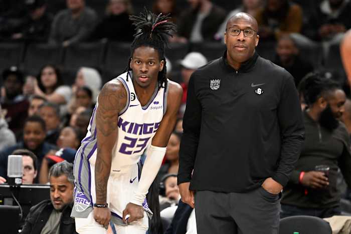 Mar 18, 2023; Washington, District of Columbia, USA; Sacramento Kings head coach Mike Brown with guard Keon Ellis (23) against the Washington Wizards during the second half at Capital One Arena. Mandatory Credit: Brad Mills-USA TODAY Sports