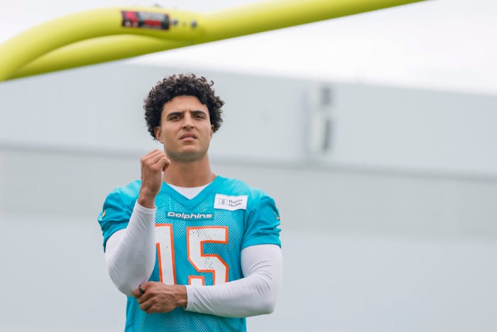 Miami Dolphins linebacker Jaelan Phillips looks on with his helmet off