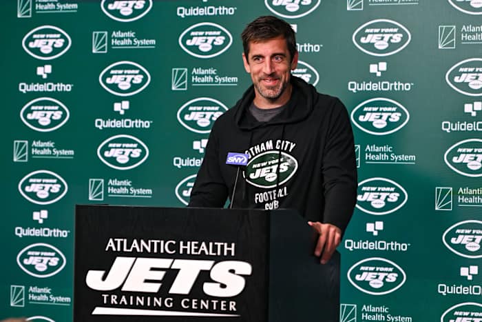 Jets' QB Aaron Rodgers at the podium during OTAs