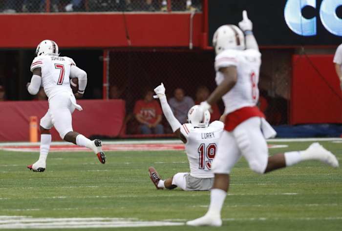 Juwaun Johnson scores on NIU’s second pick-six.