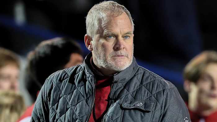 Razorbacks athletics director Hunter Yurachek on sidelines at Liberty Bowl