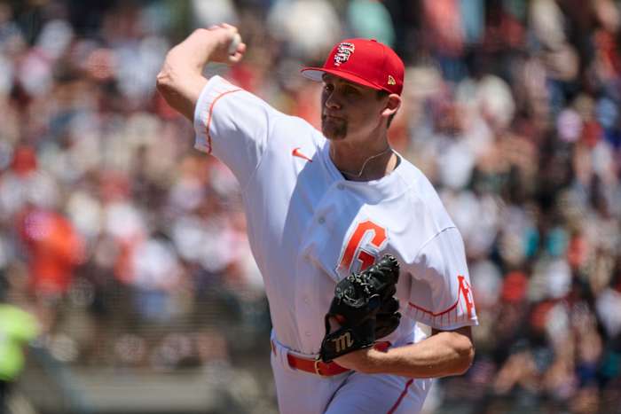 SF Giants starting pitcher Keaton Winn throws a pitch against the Seattle Mariners during the first inning at Oracle Park on July 4, 2023.