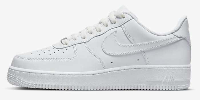 Side view of a white Nike Air Force 1 Low sneaker.