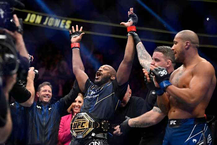 Jon Jones claims the UFC's heavyweight title.