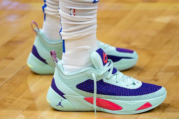Side view of Luka Doncic's green and blue Jordan Brand shoes.