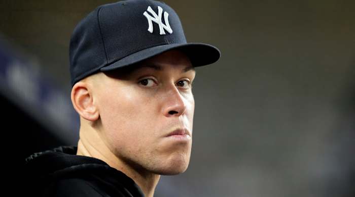 FILE - New York Yankees outfielder Aaron Judge stands in the dugout in the seventh inning of a baseball game against the Seattle Mariners, Tuesday, June 20, 2023, in New York. Major League Baseball has big plans for Europe with a reintroduction coming this weekend when the St. Louis Cardinals and Chicago Cubs square off for a two-game series in London. The New York Yankees and Boston Red Sox featured in London four years ago before the pandemic threw a curveball into the league’s plans. (AP Photo/John Minchillo, File)