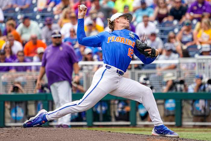Jun 25, 2023; Omaha, NE, USA; Florida Gators starting pitcher Hurston Waldrep (12) throws a pitch against the LSU Tigers during the first inning at Charles Schwab Field Omaha. Mandatory Credit: Dylan Widger-USA TODAY Sports